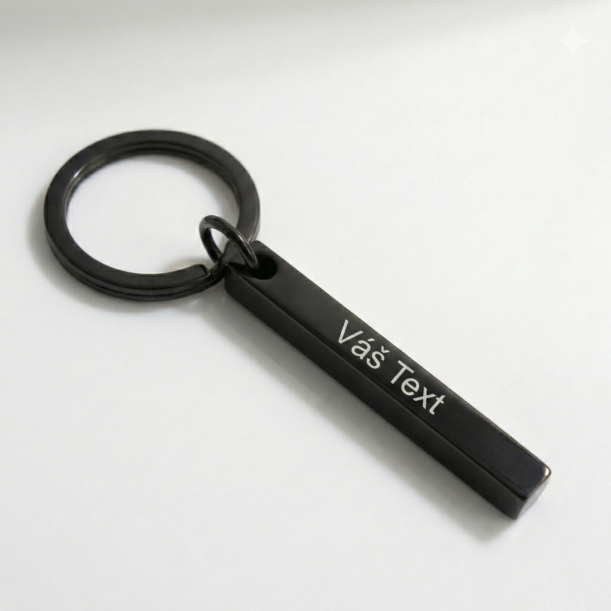 3D klíčenka z nerezové oceli s vlastním textem