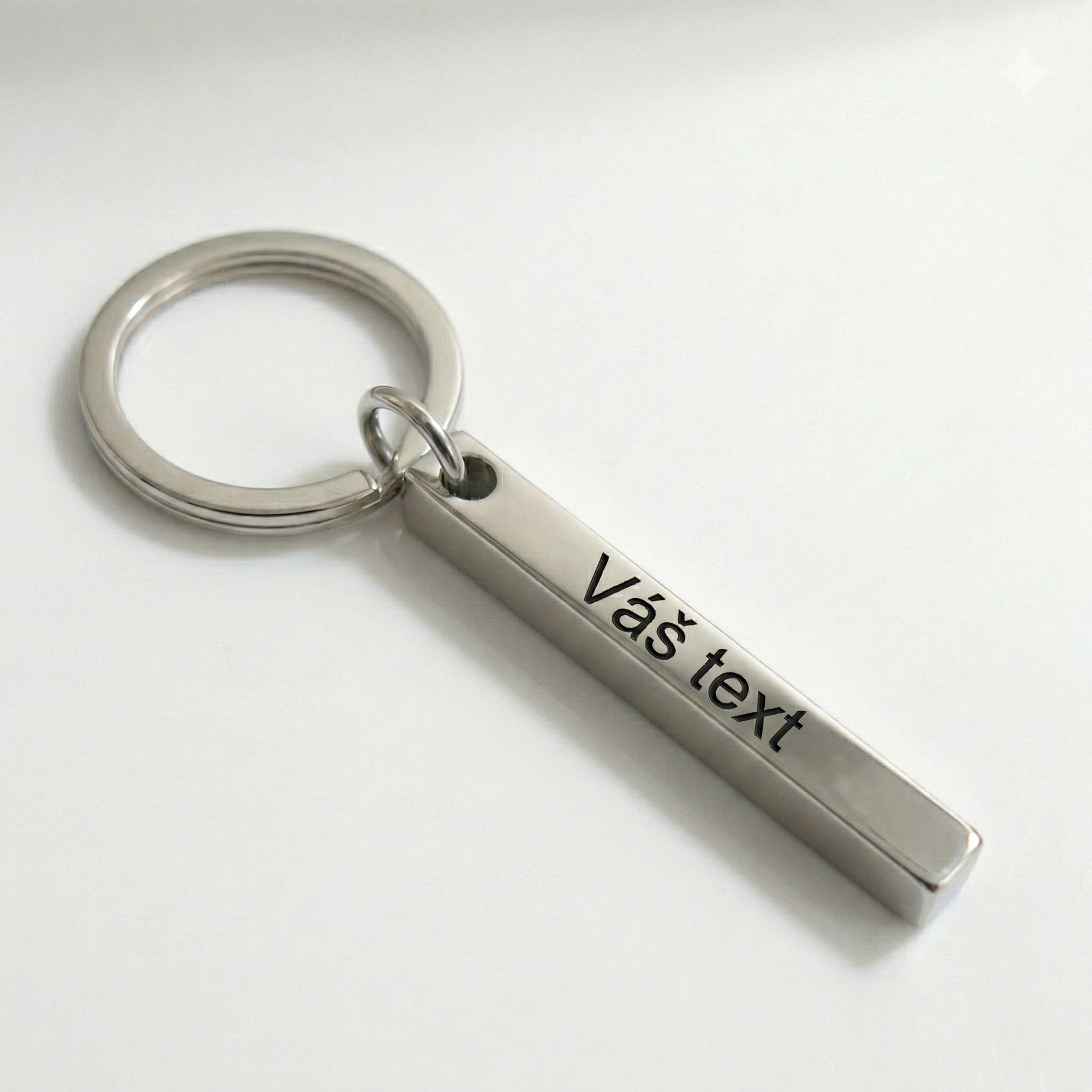 3D klíčenka z nerezové oceli s vlastním textem